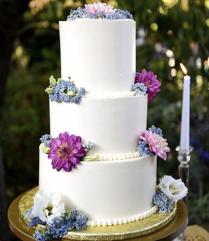 Three-tiered cake in smooth texture.
