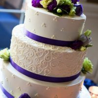 Detail of tri dot and scroll work wedding cake details.