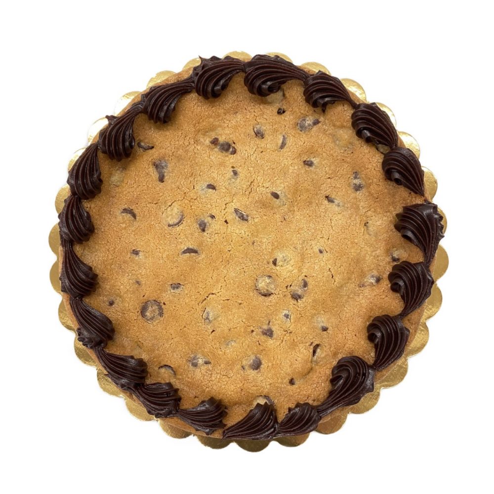 Top view of giant chocolate chip cookie with fudge border.