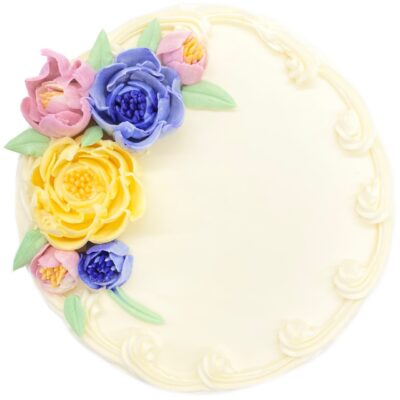 Top view of Floral Bouquet decoration on round cake frosted in white buttercream.