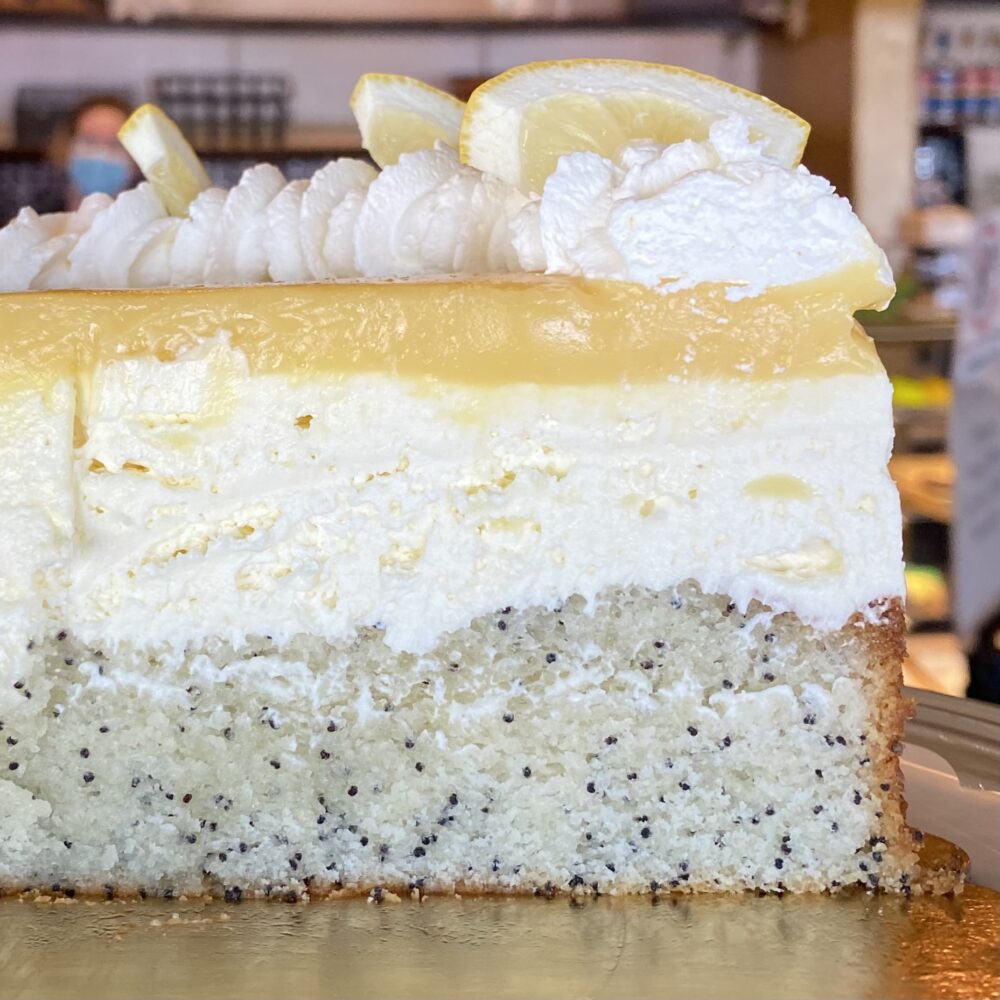 Slice of Lemon Zinger cake showing cake layers.