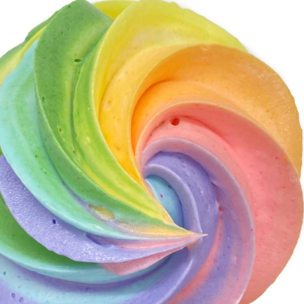 Detail pastel rainbow cupcakes.