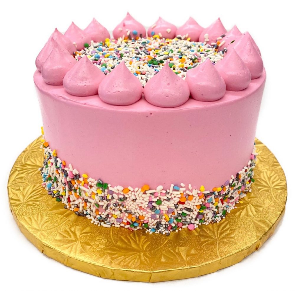 Celebration cake in pink buttercream.