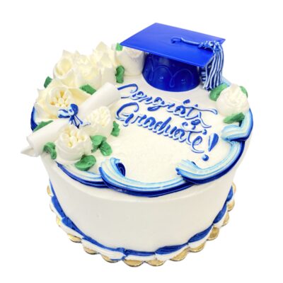 Side view of Roses Graduation decoration on round cake frosted in white buttercream with blue details.