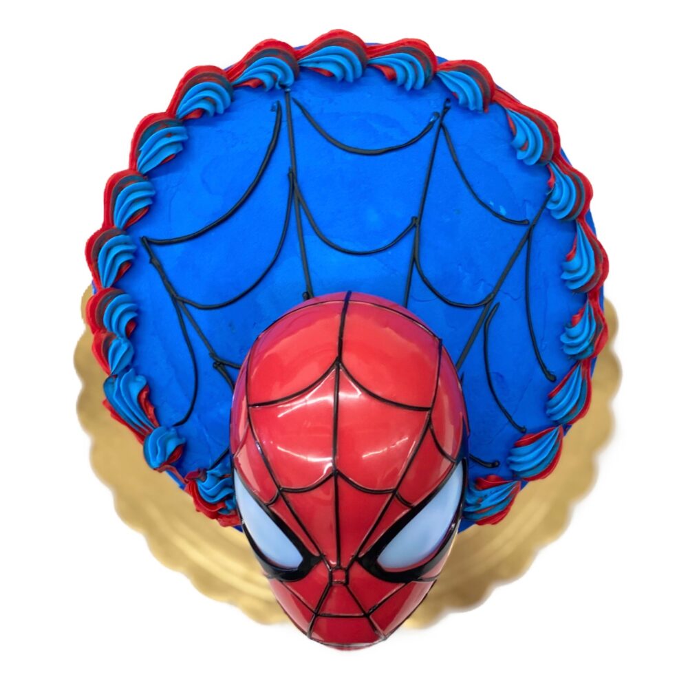Top view of Spider-Man decoration on round cake.