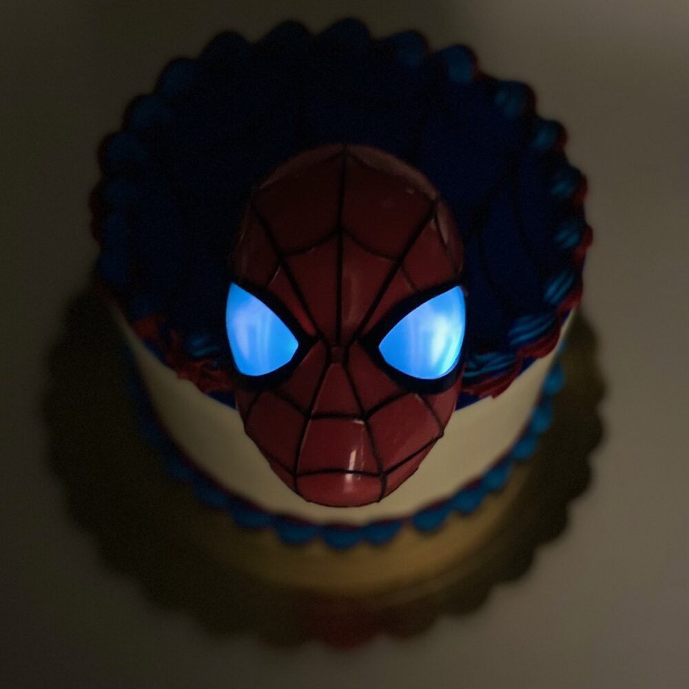Light up eyes example on Spider-Man decorated cake.