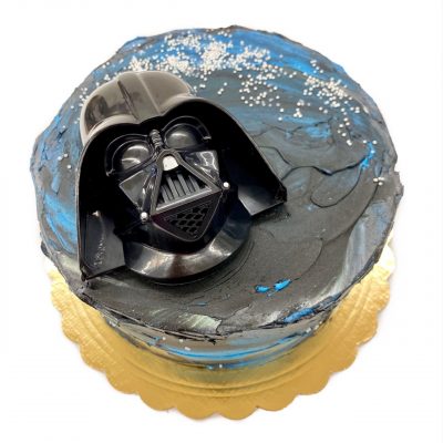 Star Wars Darth Vader decoration on a round cake.