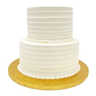 Example of two-tiered horizontal style cake in white buttercream.